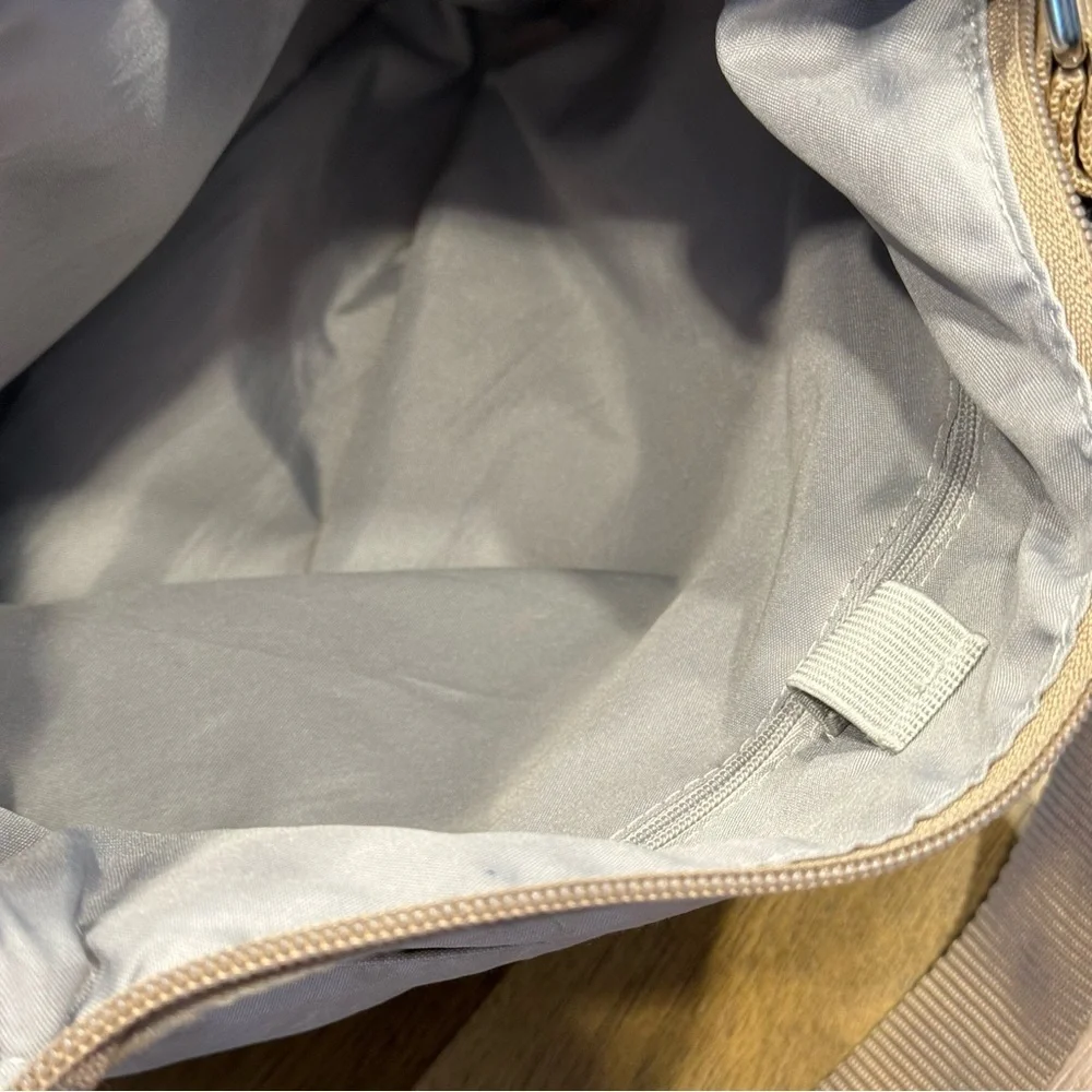 Baggallini beige crossbody backpack